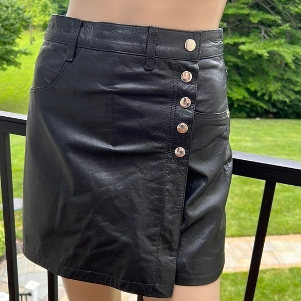 Black vegan leather snap front mini skort
